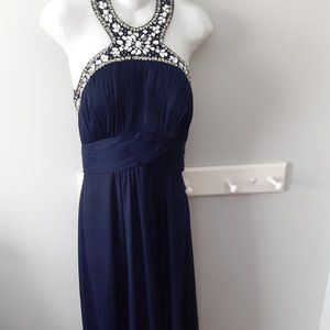 LONG, NAVY DRESS, LINED W/ BEAUTIFUL NECKLINE.  SIZE 8. LIKE NEW.